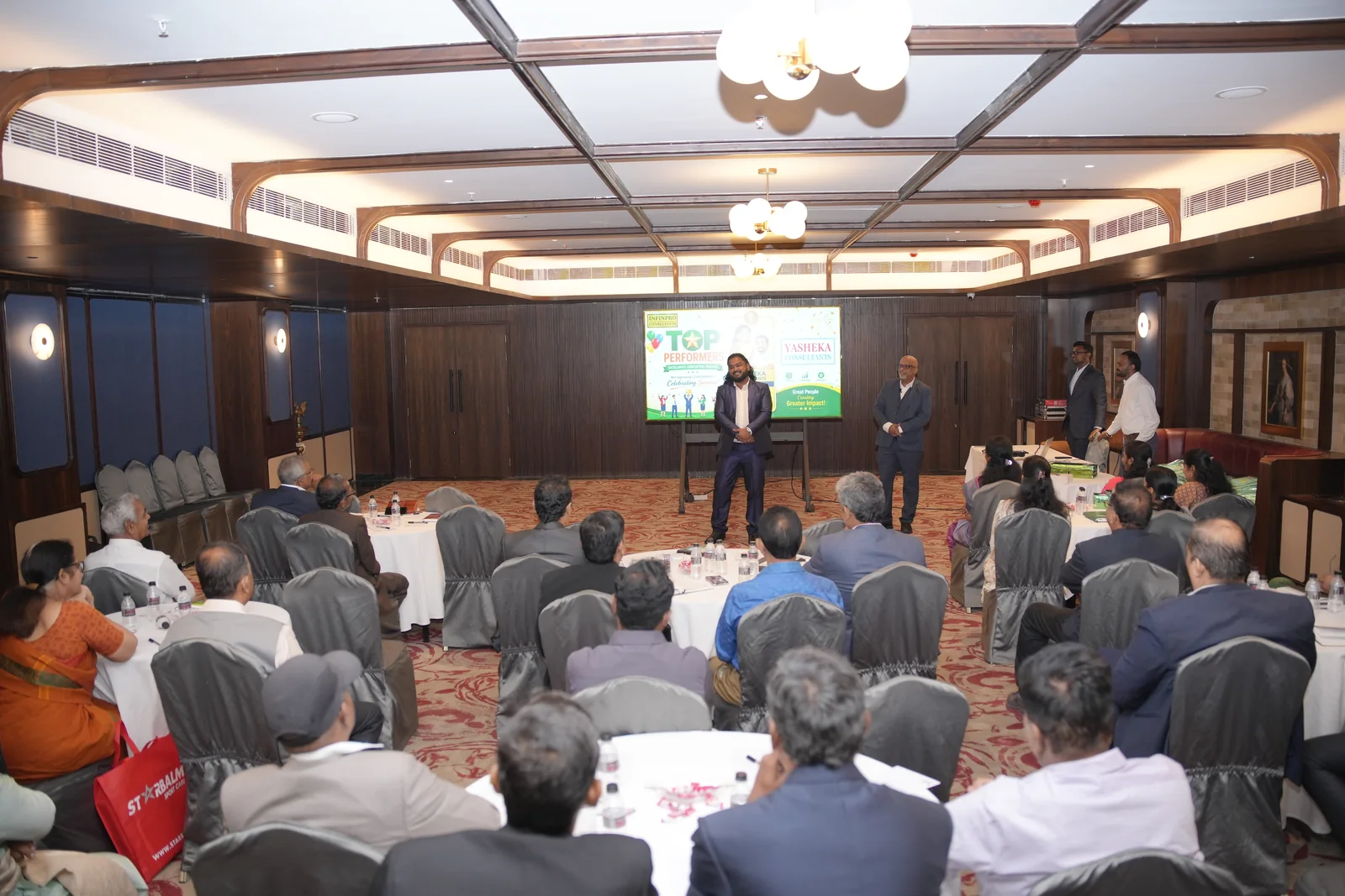 Presenters leading a discussion with the Leadership Summit audience